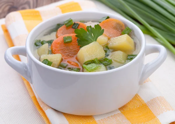 Vegetable soup with chicken on table — Stock Photo, Image