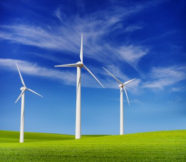 wind turbines in the green hills
