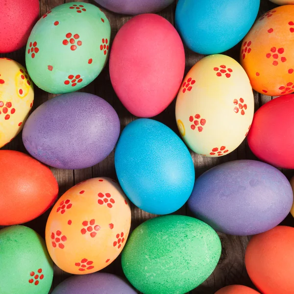 Concept holiday background. Easter eggs photographed from above — Zdjęcie stockowe