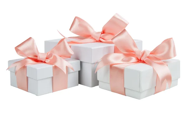 White boxes with pink ribbons isolated on white background — Stock Photo, Image