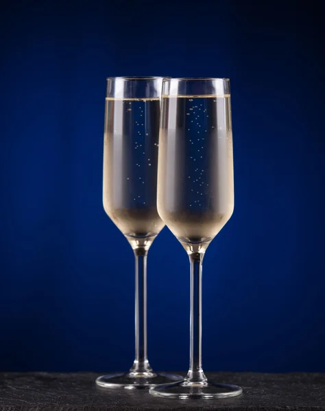 Two glasses of cold champagne. Christmas concept — Stock Photo, Image