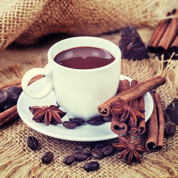 Hot chocolate, chocolate chips, cinnamon and star anise. vintage Stock Image