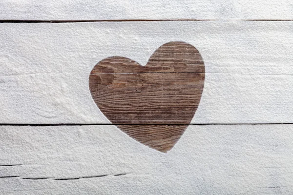 Heart of flour on the old board. Easter concept. — Stock Photo, Image