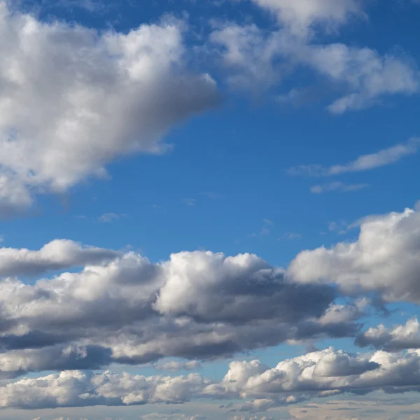 Blue sky background with clouds — Stock Photo, Image
