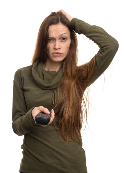 Vrouw op een witte achtergrond afstandsbedieningen — Stockfoto