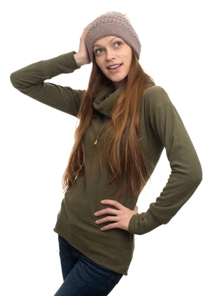 Surprised young woman in knitted cap — Stock Photo, Image