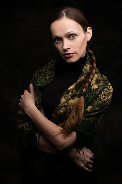 Beautiful young woman in shawl — Stock Photo, Image