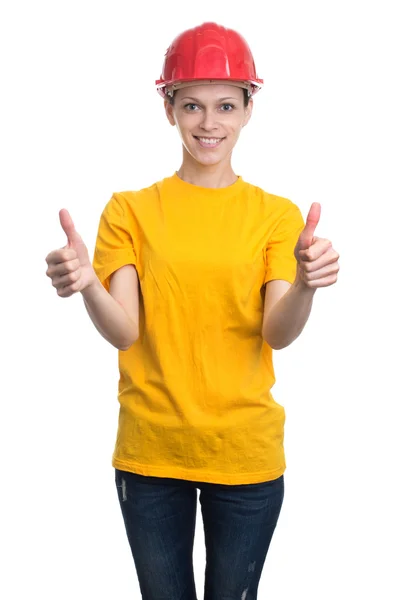 Woman in a protective helmet showing thumbs up — Stock Photo, Image