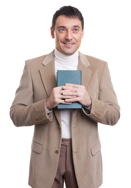 Un hombre guapo sosteniendo el libro. Aislado — Foto de Stock