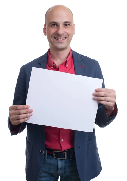 Hombre calvo guapo mostrando letrero en blanco —  Fotos de Stock