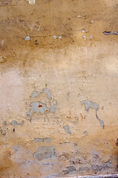 Старая желтая стена. Тонкая текстура — стоковое фото