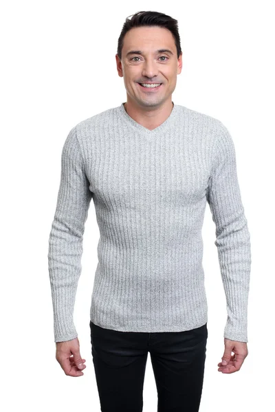 Sexy homem na moda em suéter e jeans — Fotografia de Stock