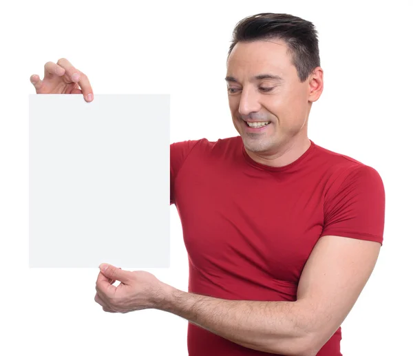 Fitnesstrainerin zeigt leeres weißes Papier — Stockfoto