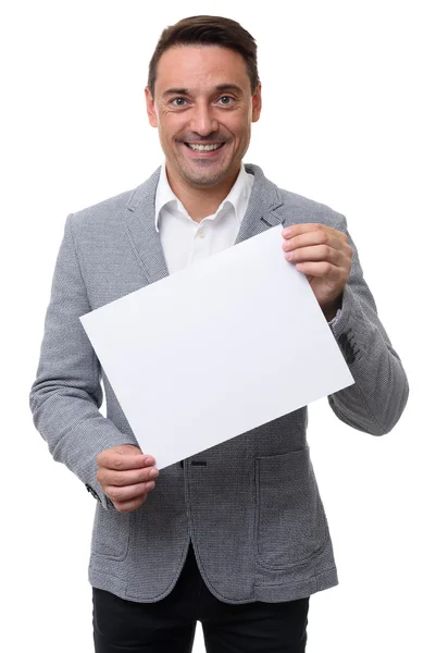 Jovem bonito homem mostrando branco tabuleta — Fotografia de Stock