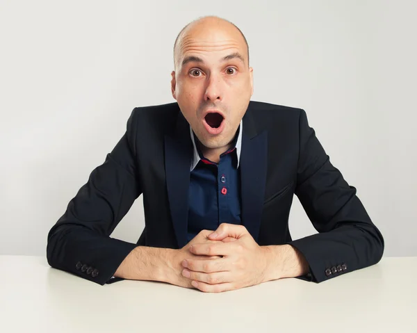 Shocked bald businessman — Stock Photo, Image