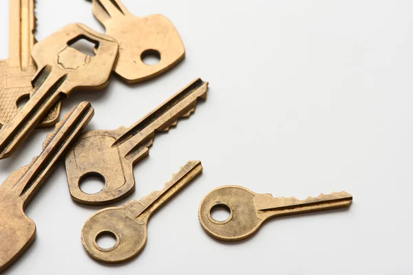 Old keys on white background — Stock Photo, Image