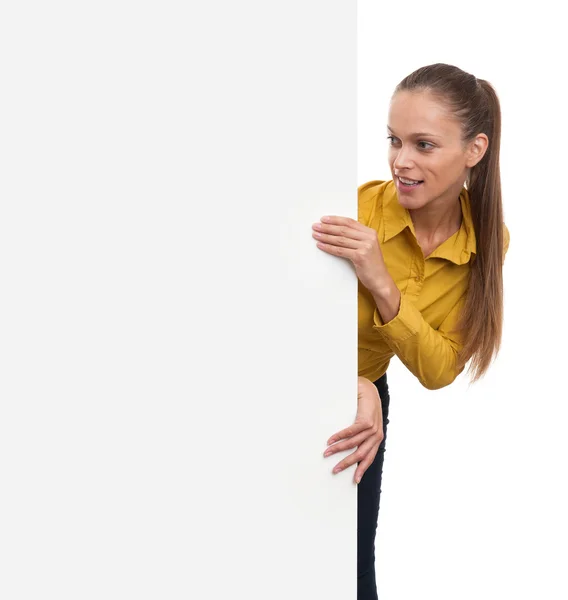 Young smiling woman showing blank card — Stock fotografie