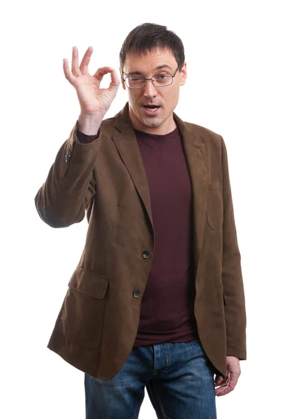 Portrait of a young man showing Ok sign — Stock Photo, Image