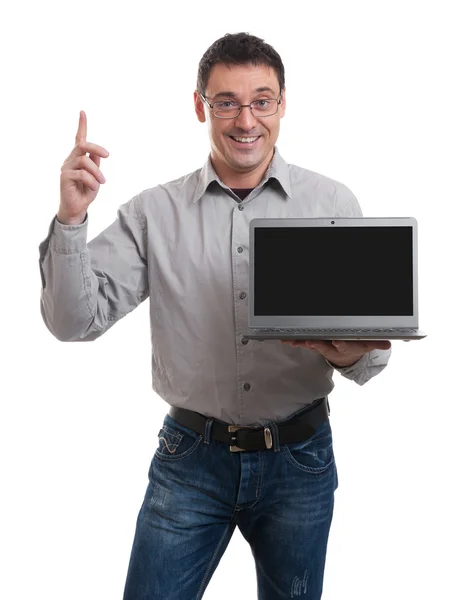 Confident young man advertising laptop Royalty Free Stock Images
