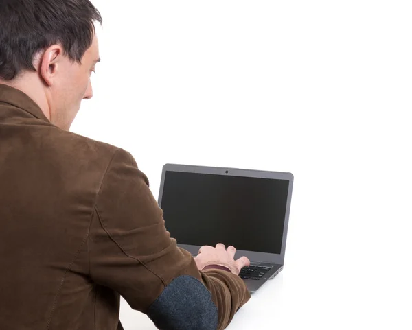 Uomo d'affari con un computer portatile — Foto Stock