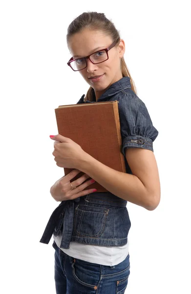 Giovane donna in possesso di un libro — Foto Stock