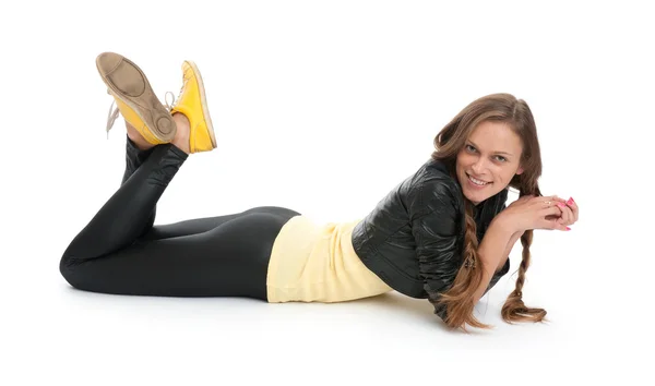 Young woman lying on a white — Stock Photo, Image