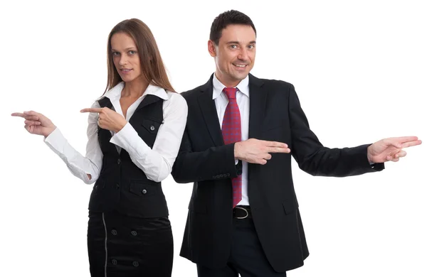 Business people pointing in different directions Stock Photo
