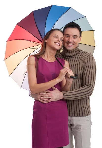 Happy couple with umbrella — Stock Photo, Image