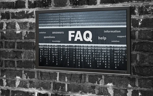 Monitor con FAQ su schermo — Foto Stock