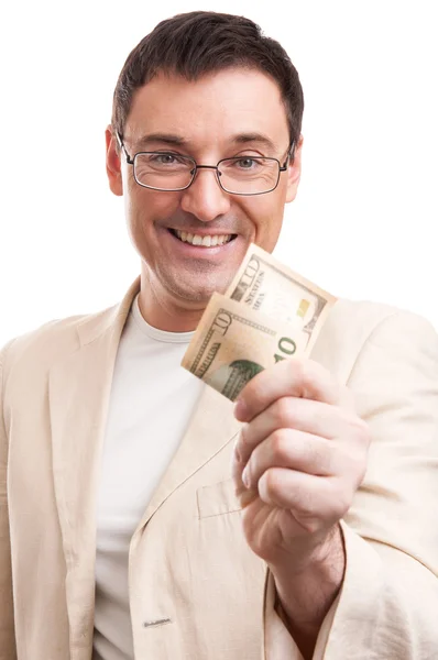 Hombre de negocios guapo dando dinero — Foto de Stock