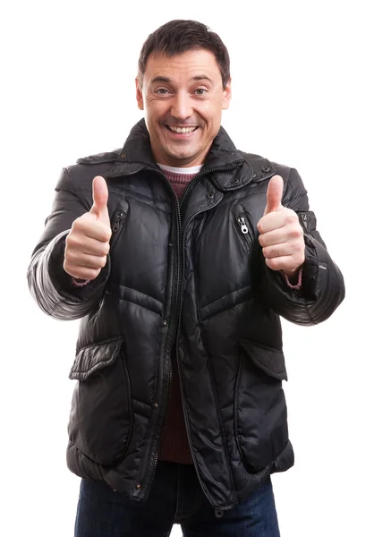 Bonito homem de jaqueta mostrando os polegares para cima — Fotografia de Stock