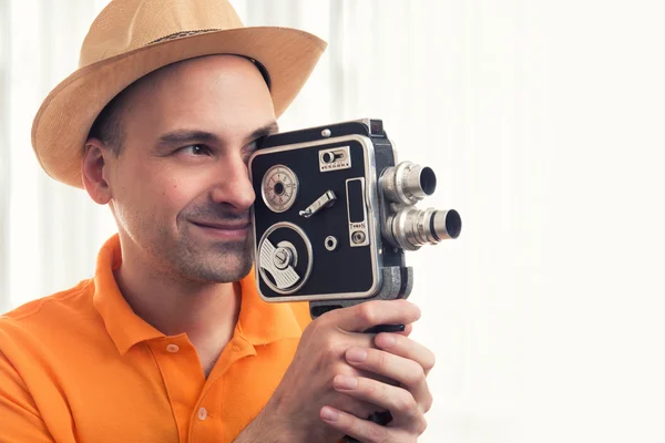 Man with retro camera — Stock Photo, Image