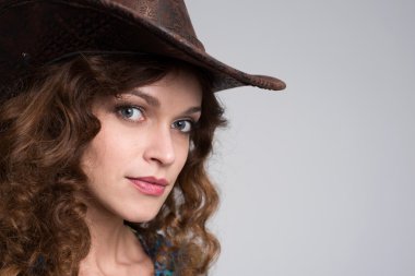 Young lady in a cowboy hat clipart