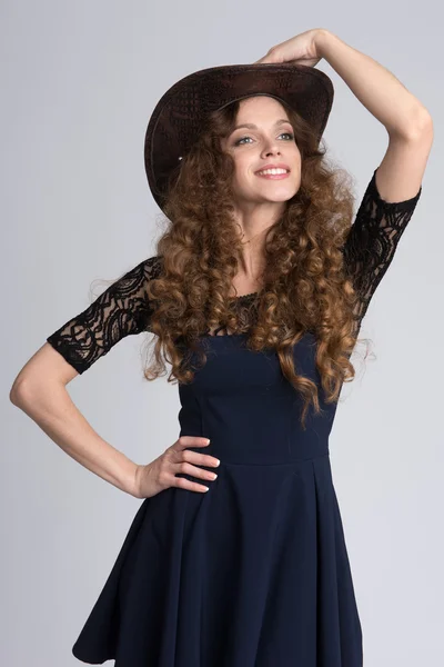 Beautiful woman model with curly hair — Stock Photo, Image