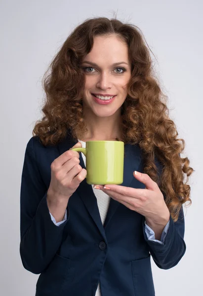 Portrait of young woman with cup — Stock Photo, Image