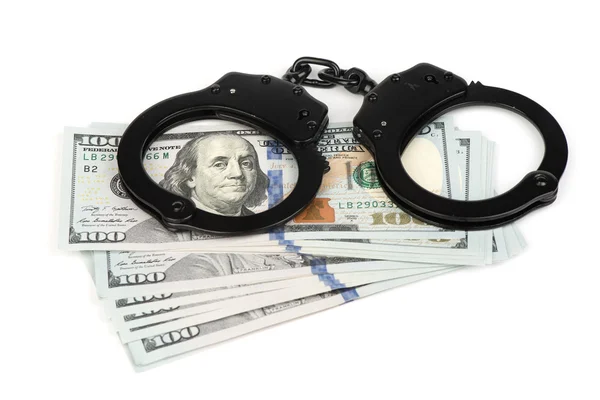 Handcuffs on money — Stock Photo, Image