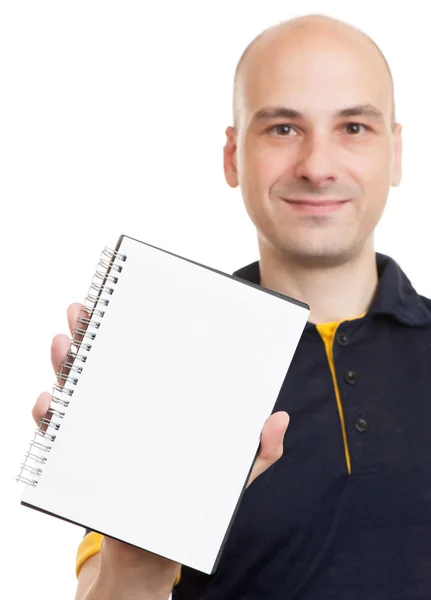 Careca mostrando bloco de notas em branco — Fotografia de Stock