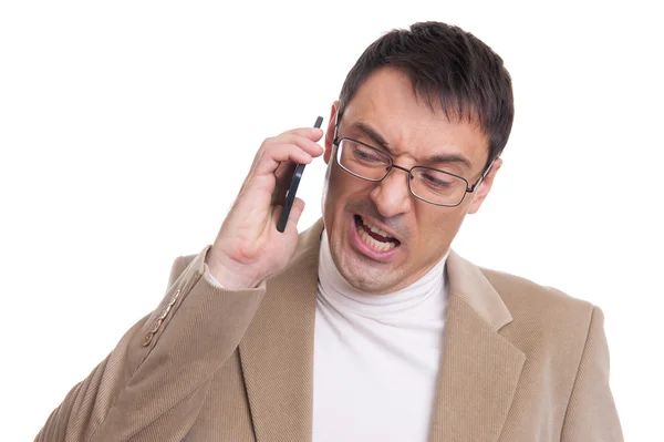 Angry business man screaming on mobile phone — Stock Photo, Image