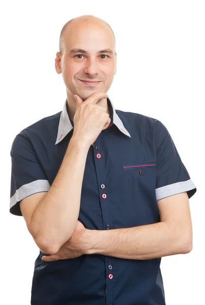 Joven sonriendo con la mano en la barbilla — Foto de Stock