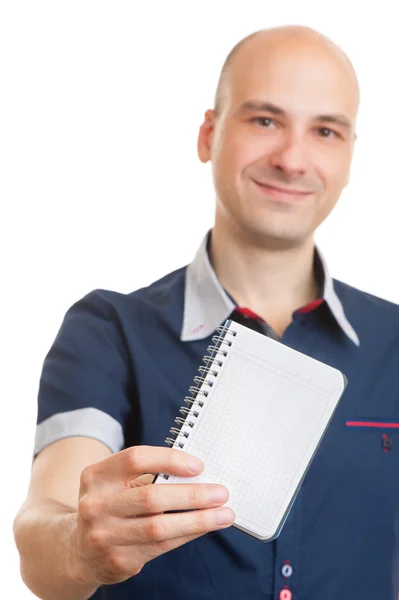 Calvo mostrando un bloc de notas en blanco —  Fotos de Stock