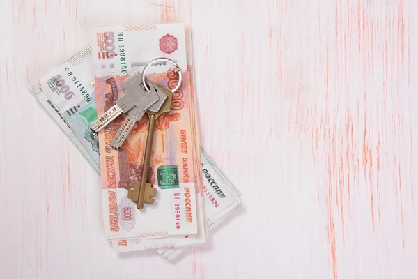 House keys and banknotes — Stock Photo, Image