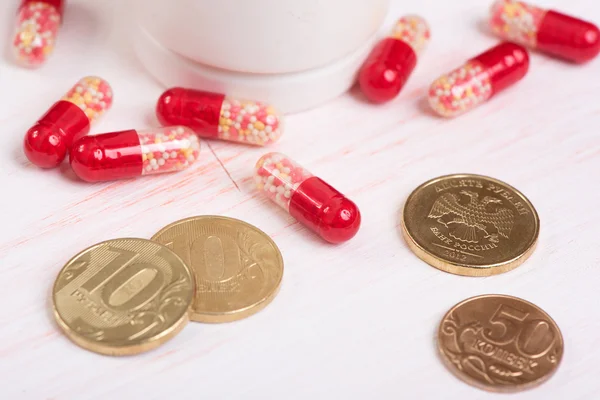 Pills and money. Health care concept — Stock Photo, Image