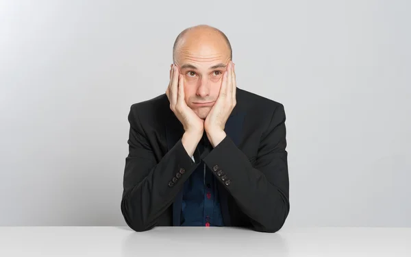 Thoughtful bald businessman — Stock Photo, Image