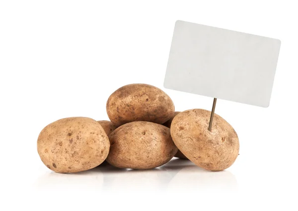 Fresh potatoes with price tag — Stock Photo, Image