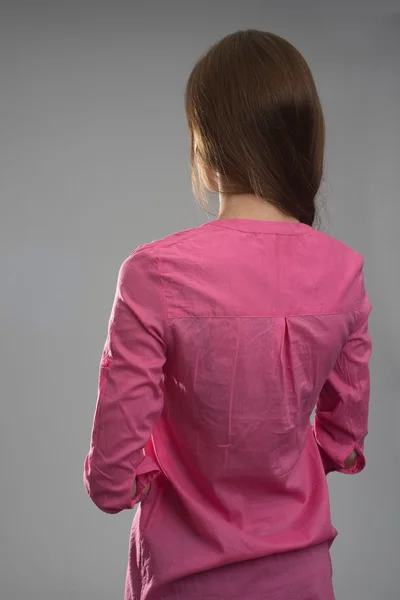 Rear view of casual woman standing — Stock Photo, Image