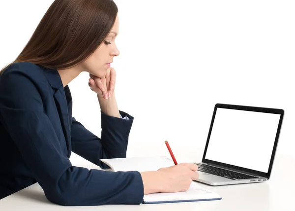 Business woman with laptop at the desk — Stock Photo, Image