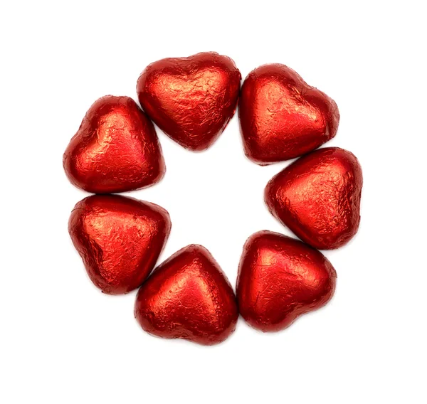 Corazones de chocolate rojo aislados en blanco —  Fotos de Stock