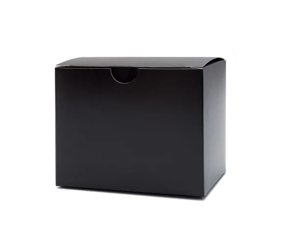 Närbild på en svart låda på vit bakgrund — Stockfoto