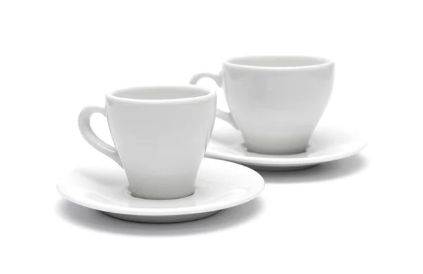 Pequeña taza de café blanco aislado en blanco — Foto de Stock