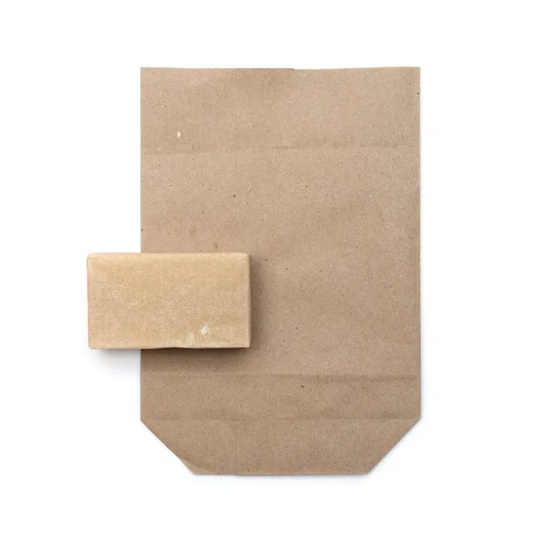 Beyaz arka plan üzerinde izole kahverengi kağıt torba — Stok fotoğraf